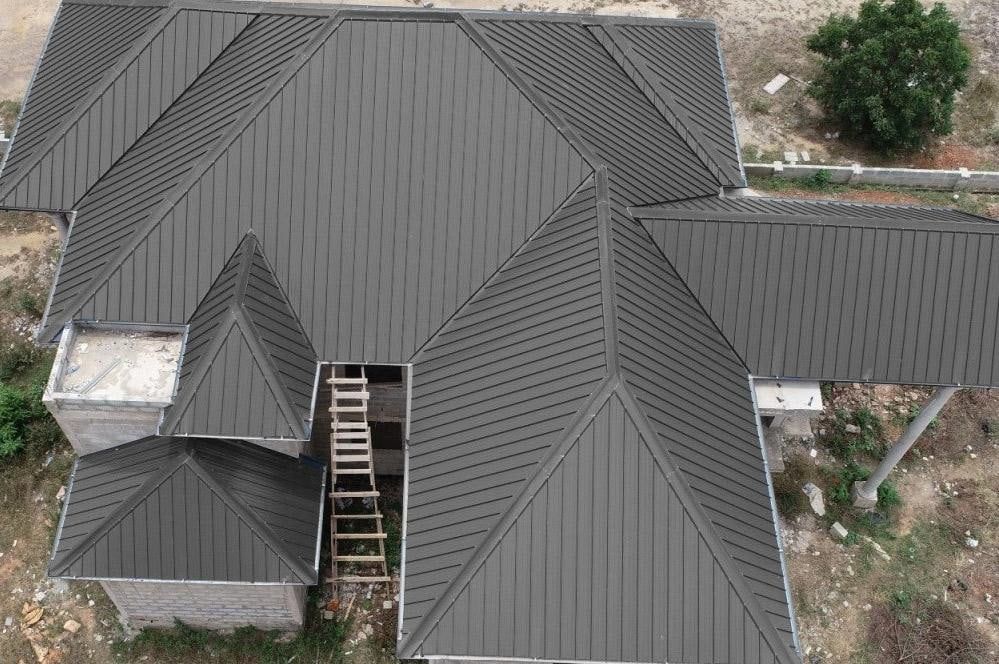 Charcoal ASA-PVC roof sheets on a house