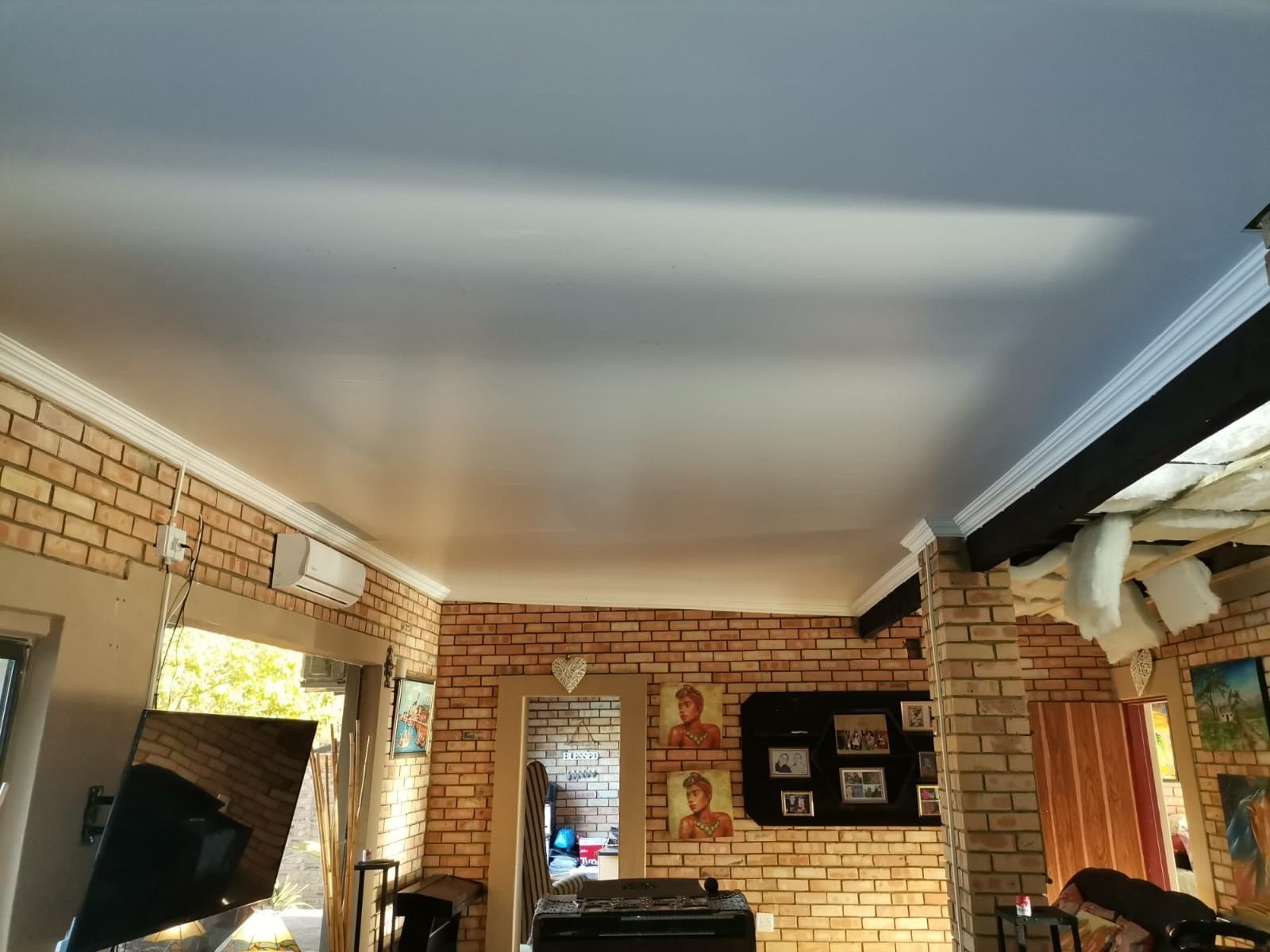 Lounge renovation with a new PVC ceiling