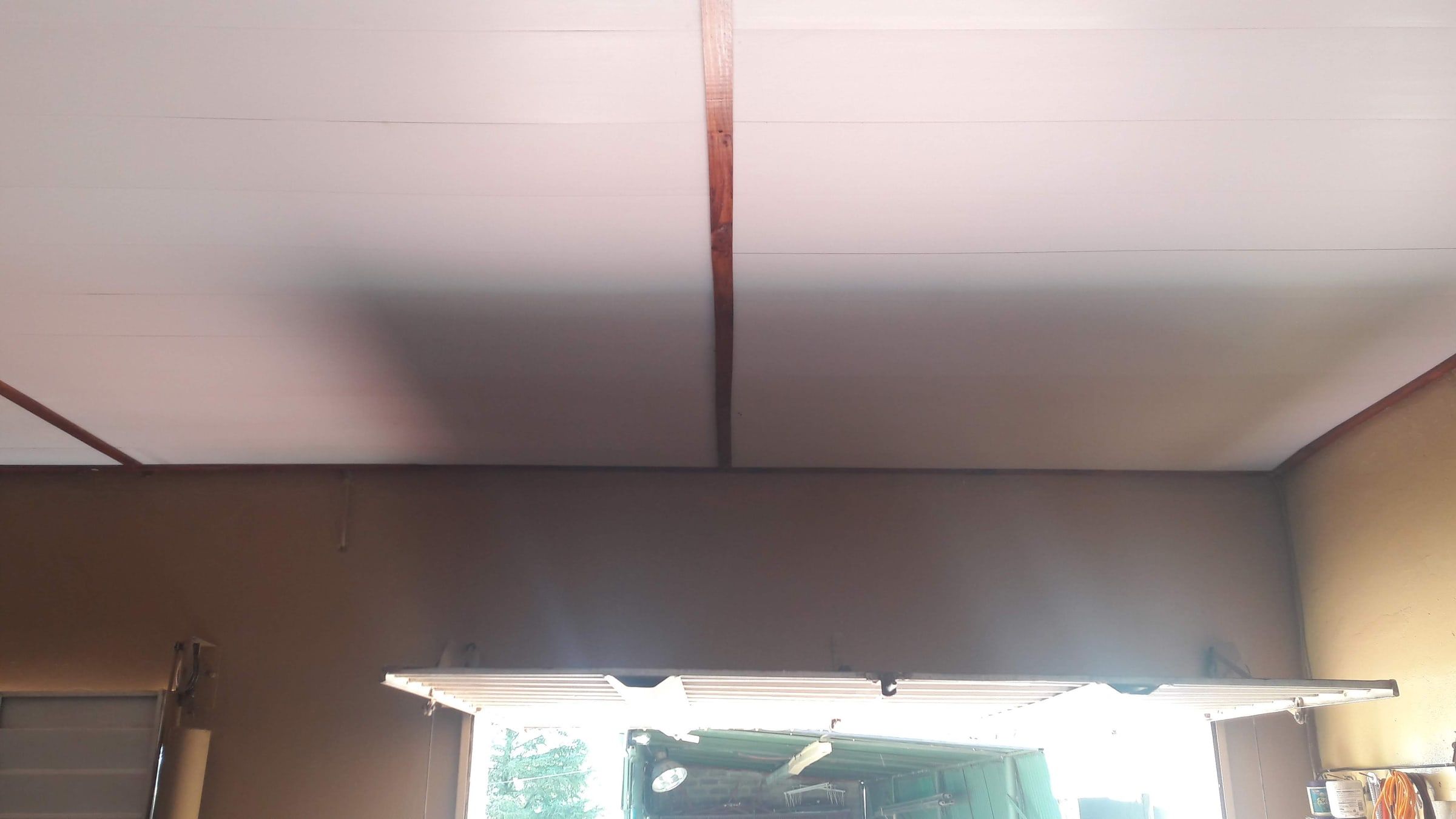 PVC ceiling with a contrasting trim on a covered patio