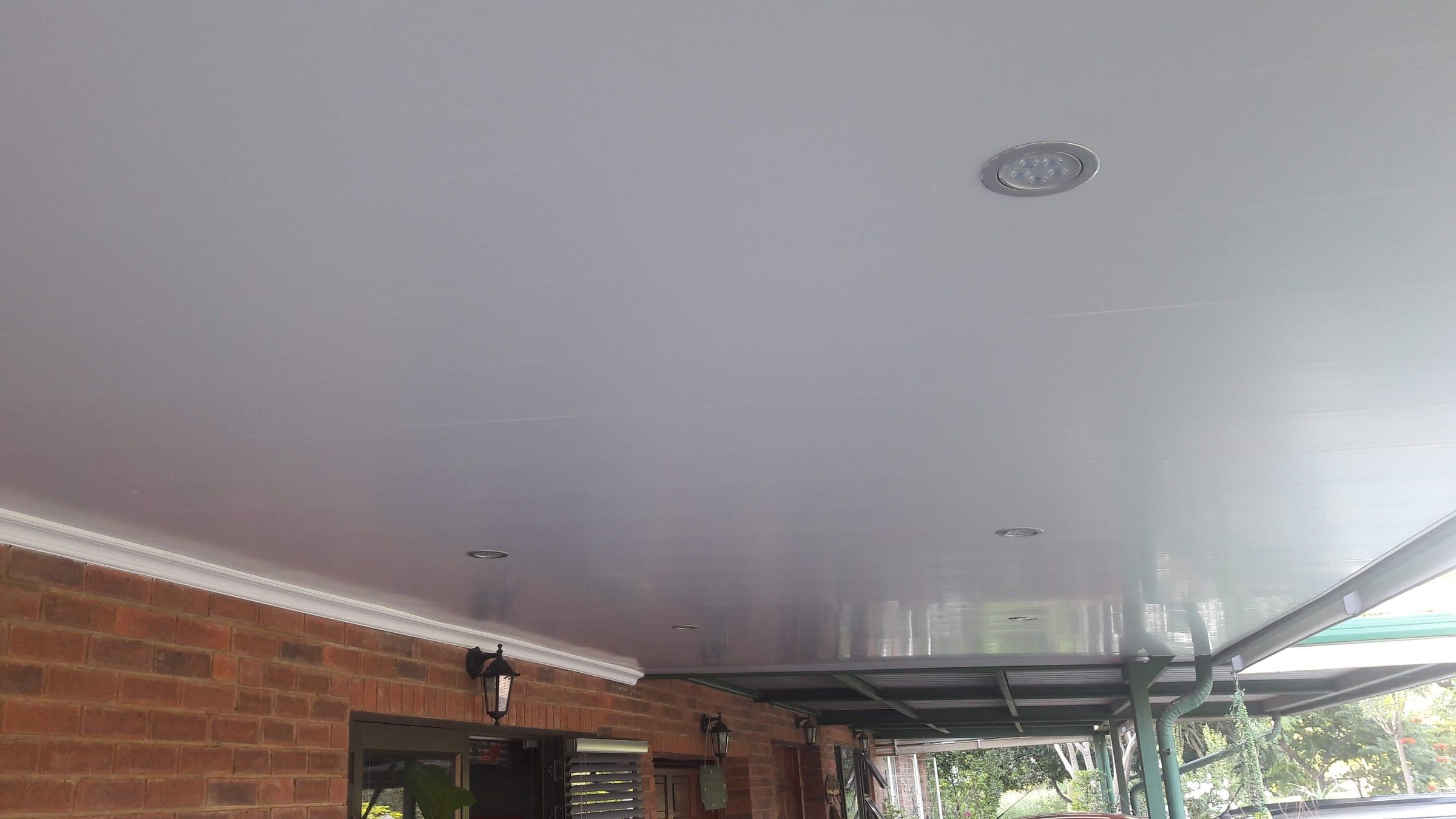 Patio PVC ceiling with a recessed LED downlight