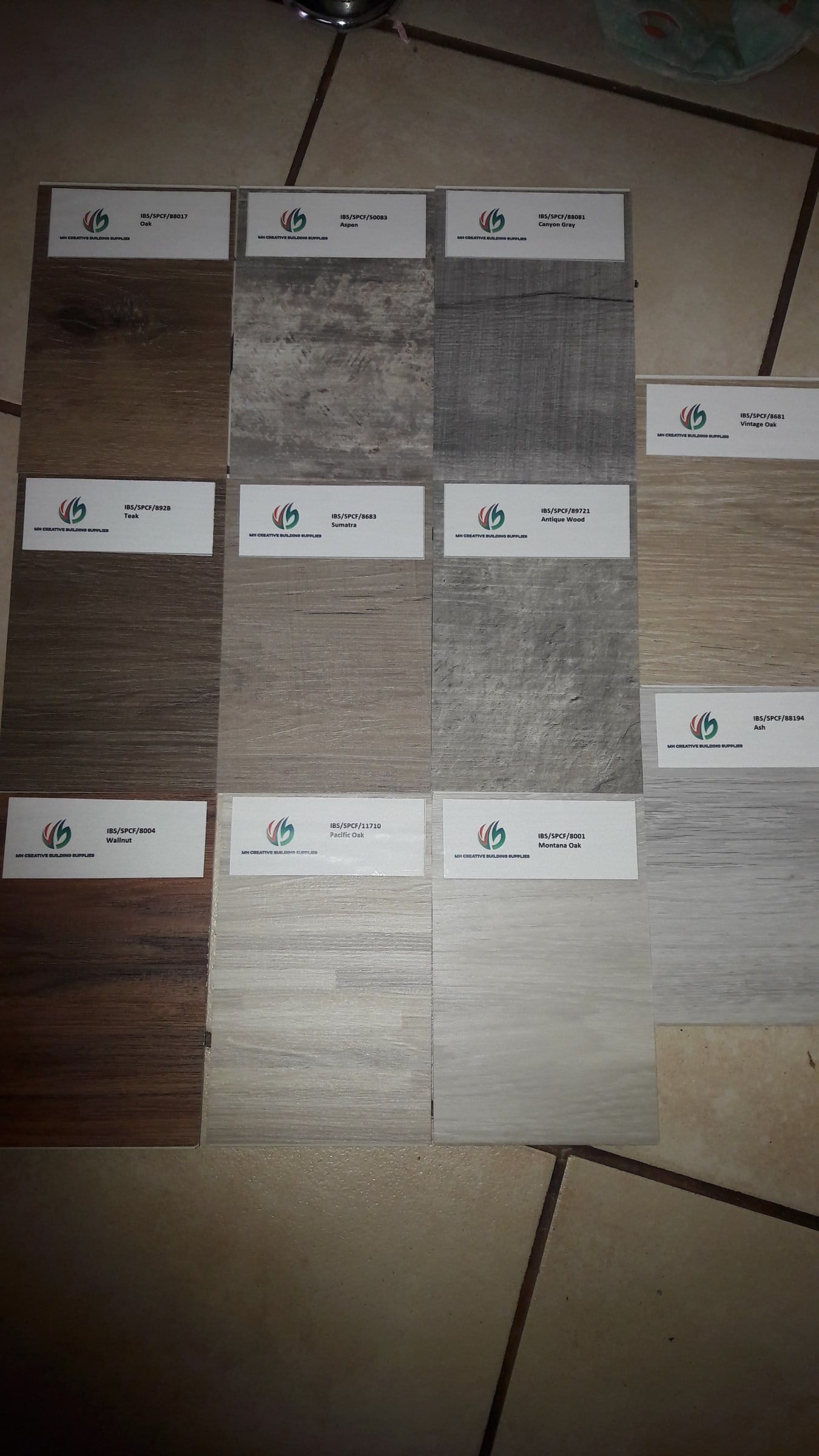 Board of SPC flooring colour samples